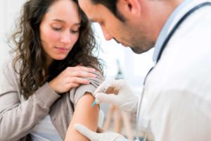 family care patient receiving vaccination lithonia GA