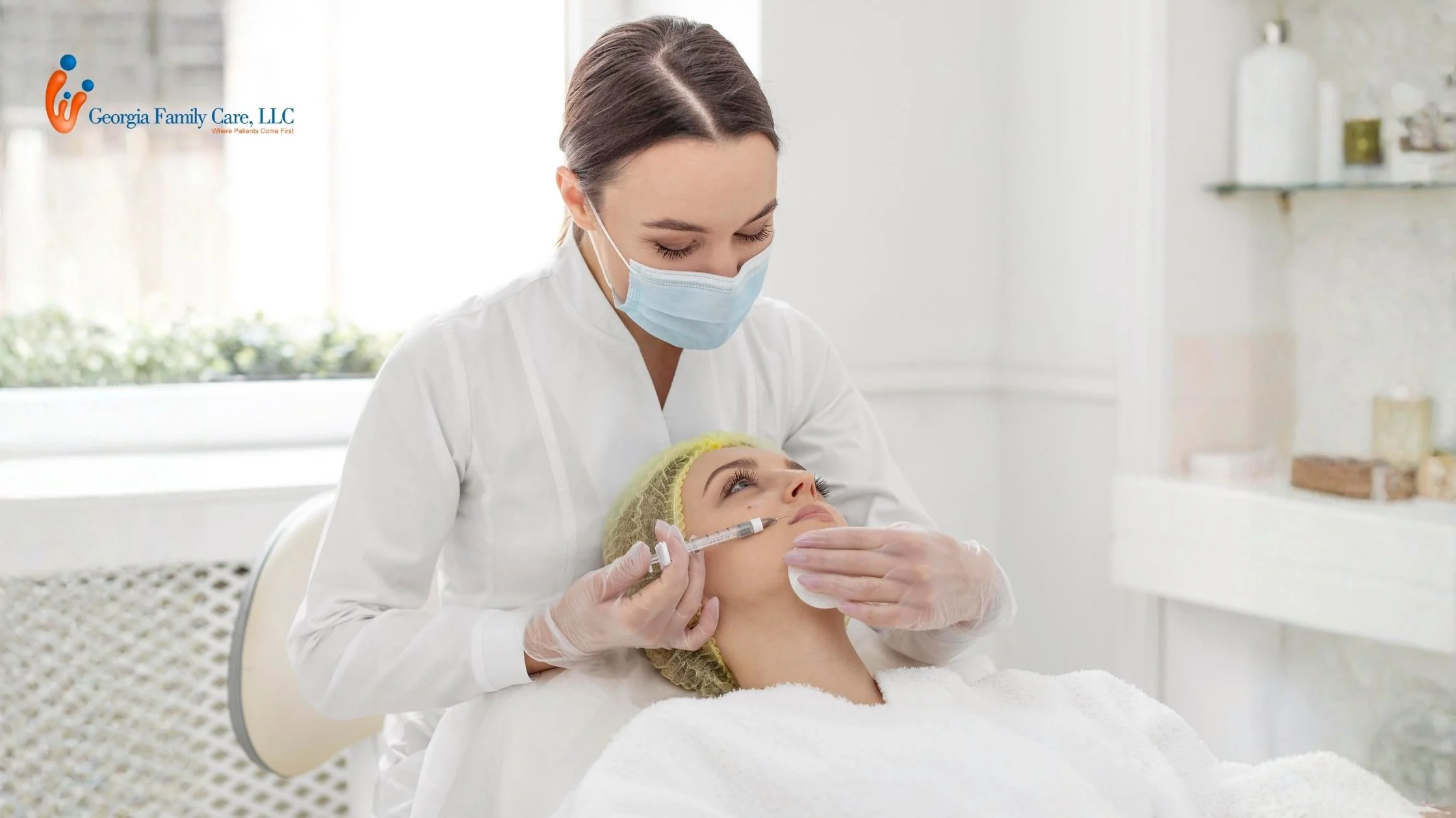 A licensed provider at Georgia Family Care is performing a professional chemical peel treatment on a patient's face