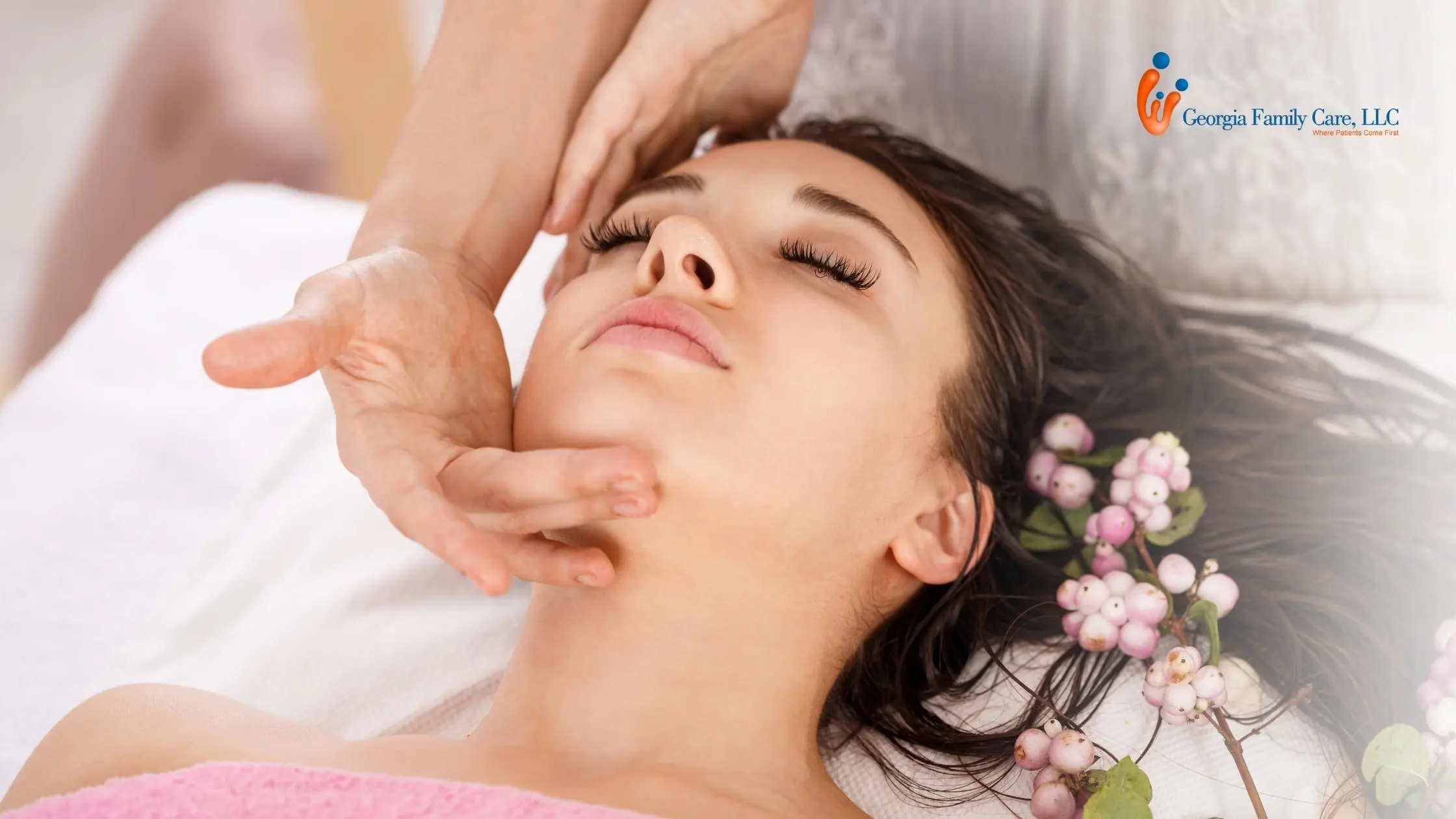 Woman receiving a relaxing facial treatment at a medical spa under professional care at Georgia Family Care Medspa.