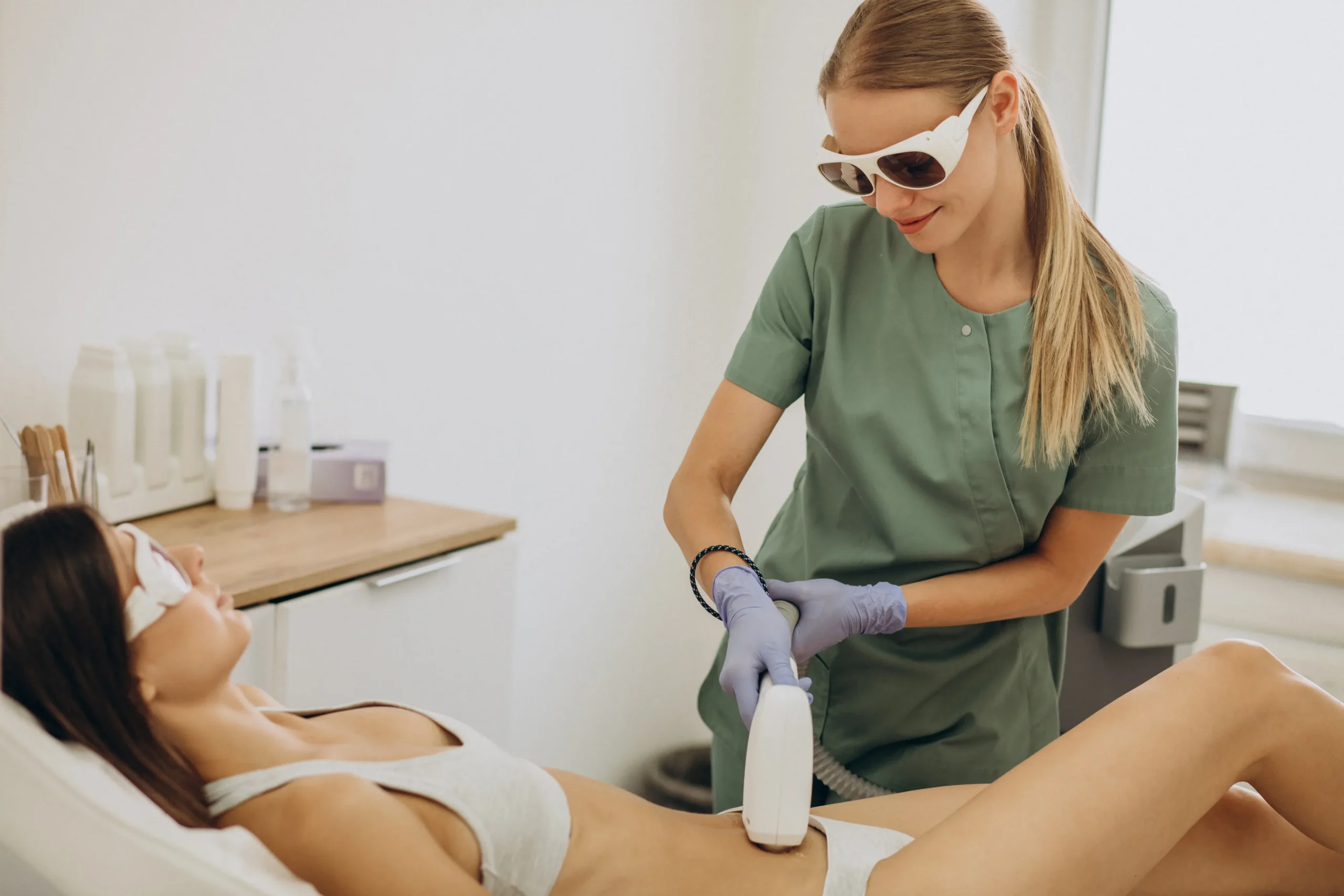 Professional laser hair removal treatment on bikini area by technician at medical spa clinic, safe and effective long-term hair reduction procedure
